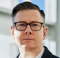 Alexander Hughes en portrait, PDG d'une entreprise de trading crypto